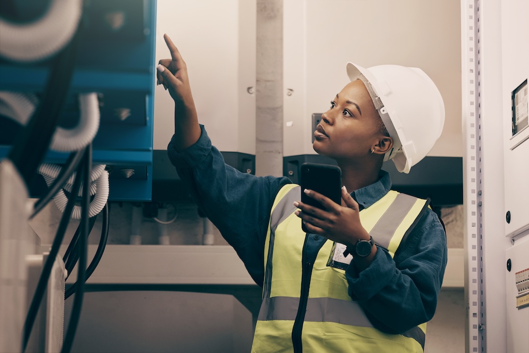 An engineering technician in a control room.